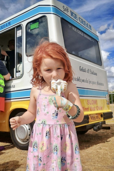ice cream copy An image of 3 people smiling in front of tents. The text below reads: Come to a summer festival created by and for home educating families. A week of camping, community, hosted activities, games, music and friendship all in the open space of Newark Showground. Tickets on sale now... www.rainbowhe.events/book2026